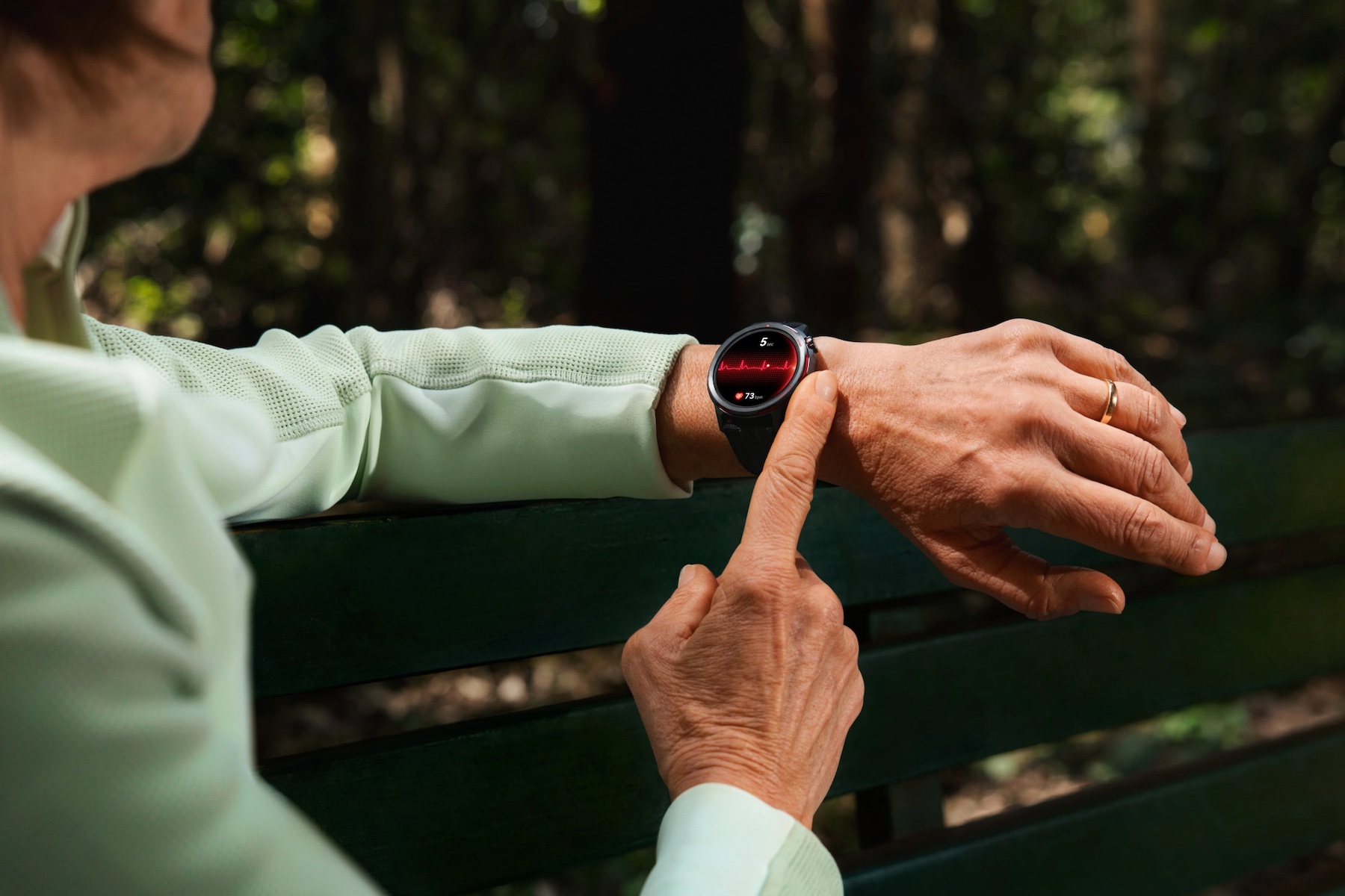 Close-up of the Huawei Watch GT Runner 2 on a wrist showing health data